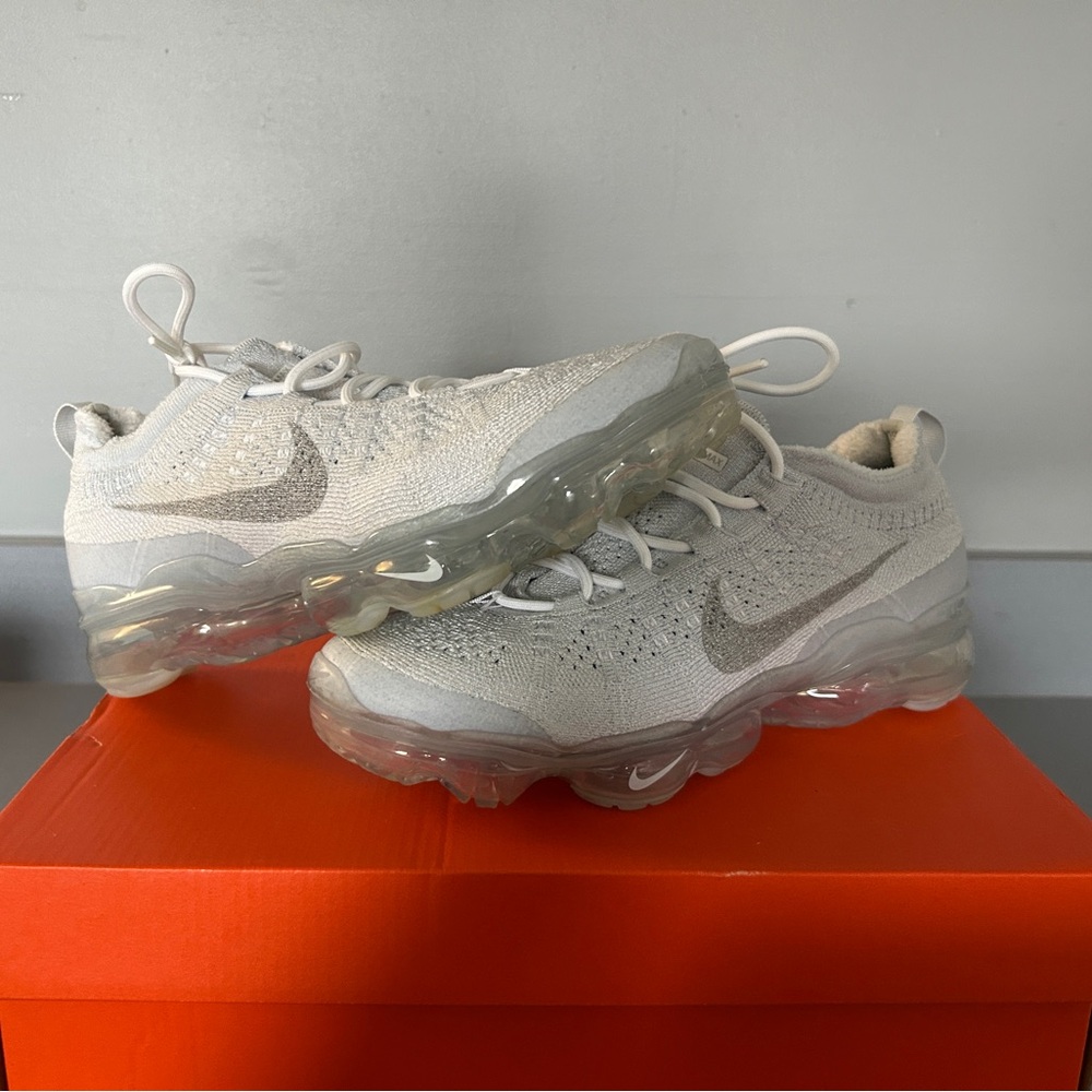 Nike Air VaporMax Flyknit White Sneakers. No box, only defect is on the bottom.